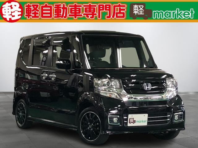 Ｎ−ＢＯＸカスタム(ホンダ) Ｇ　ターボＳＳブラックスタイルパッケージ　後期モデル　Aftermarket８インチナビ　後席フリップダウンモニター　衝突被害軽減ブレーキ　横滑り防止装置　アイドリングストップ　オートエアコン　ＨＩＤ　プッシュスタート　スマートキー　盗難警報装置　純正アルミ 中古車画像
