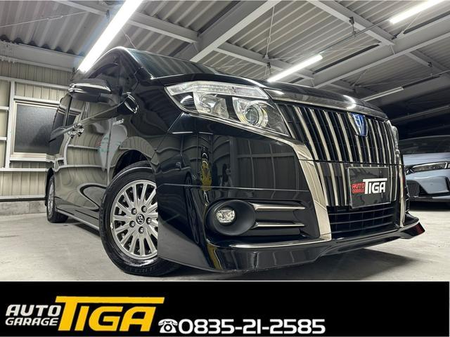 エスクァイア(トヨタ) ハイブリッドＧｉ　ブラックテーラード　／ハイブリッド／１１インチアルパインビックＸ／ＢＬＵＥＴＯＯＴＨ／フルセグＴＶ／ＨＤＭＩ／バックモニター／アルパインフリップダウンモニター／シートヒーター／クルーズコントロール／シートヒーター／ＥＴＣ 中古車画像