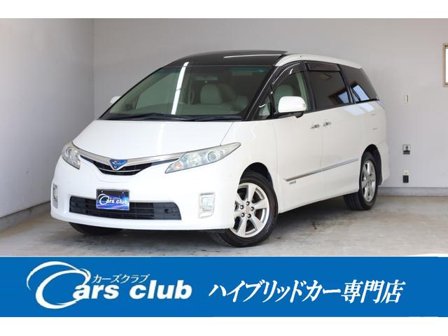 エスティマハイブリッド(トヨタ) Ｇレザーパッケージ　４ＷＤ　大型サンルーフ　本革シート　両側電動スライドドア　電動床下格納機能　禁煙　純正８型ＨＤＤナビ　純正後席モニター　純正１７インチＡＷ　Ｗエアコン　ＡＣ１５００Ｗ　オットマン　クルーズコントロール 中古車画像