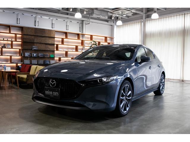 マツダ ＭＡＺＤＡ３ファストバック １５Ｓツーリング　３６０°ビューモニタ／キャリパ塗装（レッド）／クルーズコントロール／Ａｐｐｌｅ　ＣａｒＰｌａｙ・Ａｎｄｒｏｉｄ　Ａｕｔｏ対応／ＥＴＣ／ワイヤレス充電ＱＩ／ワンオーナー／禁煙車／予備キー／ＳＢＳ／ＢＳＭ