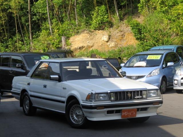 トヨタ クラウンロイヤルサルーン １ｇスーパーチャージャー レッド内装の中古車 車体価格129 8万円 1985年式 走行9 6万キロ 車体色ホワイト 広島県東広島市西条町上三永１６２７ ６ ｏｃｈｉ ｍｏｔｏｒｓ 越智モータースの在庫 グーネット中古車