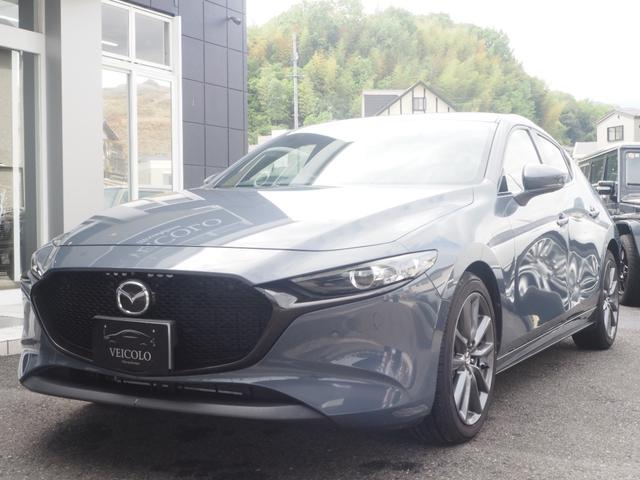 マツダ ＭＡＺＤＡ３ファストバック １５Ｓツーリング　純正ＳＤナビ　フルセグ　３６０°カメラ　レーダークルーズ　ヘッドアップディスプレイ　プッシュスタート　ＥＴＣ　ＬＥＤヘッドライト　純正１８インチアルミホイール