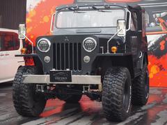 ジープ キャンバストップ マッドテレーンタイヤ 4速ミッション MT 4WD momoハンドル レザー調シートカバー RANCHO/RS5000ショックアブソーバー J58 中古車画像