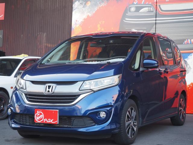 フリード(ホンダ) G・ホンダセンシング 純正ナビ フルセグ バックカメラ フリップダウンモニター 両側電動スライドドア 純正15インチアルミホイール プッシュスタート ハーフレザーシート レーダークルーズコントロール ホンダセンシング 中古車画像