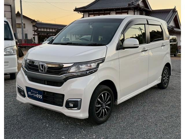 Ｎ−ＷＧＮカスタム(ホンダ) Ｇ・ターボパッケージ　４ＷＤ　バックカメラ　ＴＶナビ　オートクルーズコントロール　衝突被害軽減システム　オートライト　ＨＩＤ　スマートキー　アイドリングストップ　電動格納ミラー　ベンチシート　ＣＶＴ　盗難防止システム 中古車画像