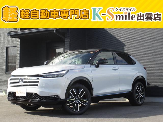 ヴェゼル(ホンダ) ｅ：ＨＥＶ　Ｚ・ＰＬａＹパッケージ　オートクルーズコントロール　アイドリングストップ　ＬＥＤヘッド　電動テールゲート　衝突被害軽減システム　リヤカメラ　横滑り防止装置　ＥＴＣ　オートライト　シートヒーター　スマートキー　両席エアバック 中古車画像