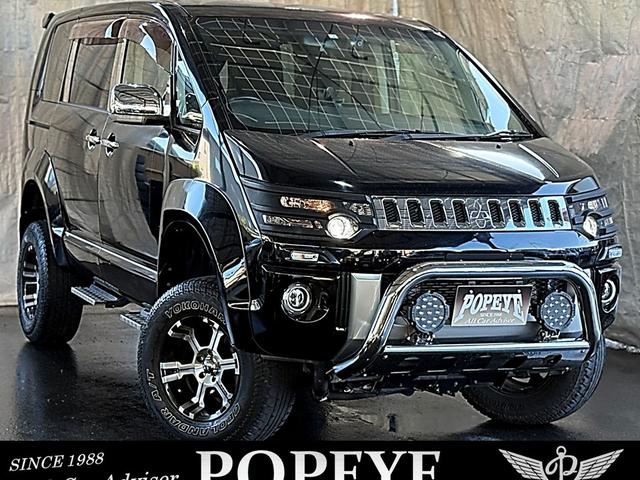 デリカＤ：５(三菱) Ｄ　パワーパッケージ　切替４ＷＤ　ディーゼルターボ　８人乗　リフトＵＰ　オーバーフェンダー　Aftermarketマフラー　１６ＡＷ　ナビ　フルセグＴＶ　Ｂｌｕｅｔｏｏｔｈ　Ｂカメラ　後席モニター　ＥＴＣ　ドラレコ　両側パワスラ　スマートキ 中古車画像