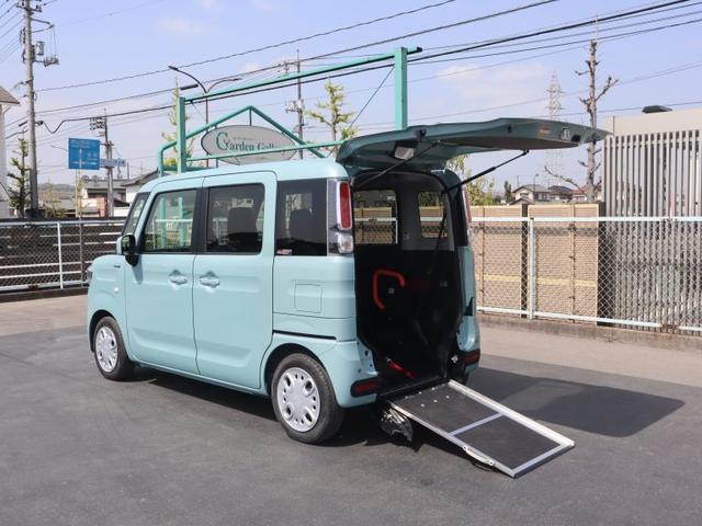 スペーシア(スズキ) ハイブリッドＸ　車いすスロープ車　車いすスロープ車　衝突被害軽減ブレーキ　アイドリングストップ　左電動スライドドア　ナビ・フルセグＴＶ　バックカメラ　フロントカメラ　ソナー　オートエアコン　シートヒーター　ドライブレコーダー 中古車画像