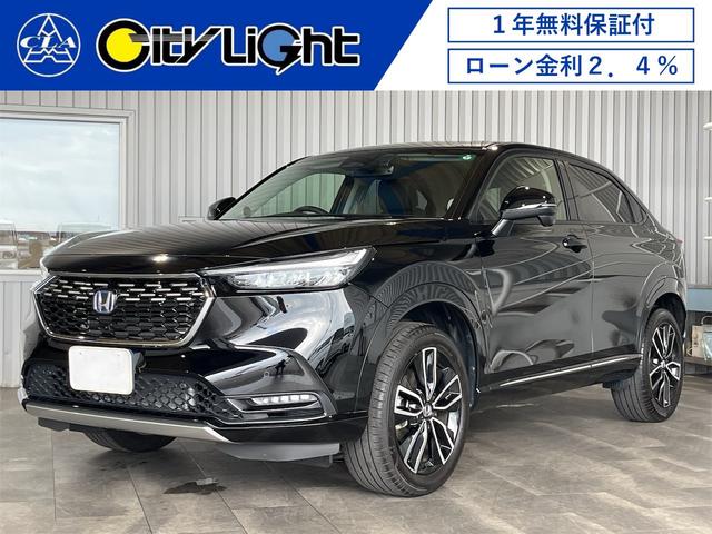 ヴェゼル(ホンダ) ｅ：ＨＥＶ　Ｚ　１年保証付・禁煙車・ワイヤレス充電器・ナビ・ＴＶ・Ｂｌｕｅｔｏｏｔｈ・マルチビューカメラ・ホンダセンシング・クルーズコントロール・ブラインドスポットモニター・パワーバックドア・シートヒーター・ドラレコ 中古車画像