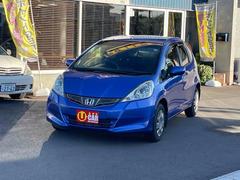 フィット G・10thアニバーサリー ETC ナビ TV オートライト スマートキー 電動格納ミラー チップアップシート CVT 盗難防止システム 衝突安全ボディ ABS CD エアコン パワーステアリング パワーウィンドウ 中古車画像