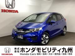 フィットハイブリッド Fパッケージ メモリーナビ ワンセグ リアカメラ ETC 盗難警報装置 AUTOエアコン 助手席エアバック ECON リヤカメラ ABS付 DVD視聴 横滑り防止システム キーレスエントリー 運転席エアバック 中古車画像