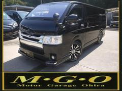 ハイエースバン ロングスーパーGL 4型仕様 ベッドキット ギャルソン17インチAW ホワイトレター HDDナビ 地デジ Bカメラ LEDヘッドライト 4型テール 社外マフラー 黒革調シートカバー 新品Fスポイラー 新品メッキグリル 中古車画像