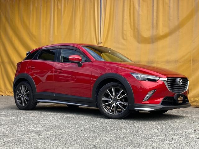 ＣＸ－３ ＸＤ　ツーリング　純正ＳＤナビ　ＤＶＤ　ＣＤ　ＢＴ　フルセグＴＶ　バックカメラ　ステアリングスイッチ　ＢＯＳＥサウンド７スピーカー　純正１８インチアルミ　ルーフスポイアー　ハーフレザーシート　純正ＬＥＤライト