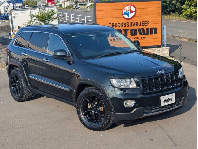 ジープ・グランドチェロキー リミテッド 4x4 新品☆NITTOリッジグラップラー☆4本 エアサスペンション WL専用18インチグロスブラックホイール パワーリアゲート シート&ステアリングヒーター オートヘッドライト コーナーセンサー(1枚目)