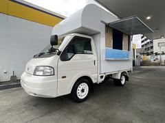 マツダ　ボンゴトラック　　移動販売車キッチンカー８ナンバー取得済み新品キッチンボックス左側跳ね上げ販売口収納式カウンター窓アクリル仕切り窓新品台下冷蔵庫３層シンク調理台換気扇室内照明室内コンセント埋め込み２００リッターの給排水