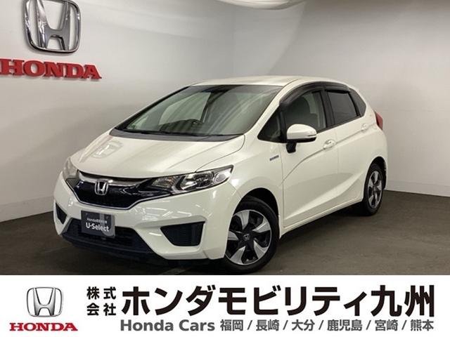 フィットハイブリッド(ホンダ) Ｆパッケージ　メモリーナビ　フルセグ　リアカメラ　地デジＴＶ　盗難警報装置　ＡＵＴＯエアコン　助手席エアバック　ＥＣＯＮ　リヤカメラ　ＡＢＳ付　ＤＶＤ視聴　横滑り防止システム　キーレスエントリー　運転席エアバック 中古車画像