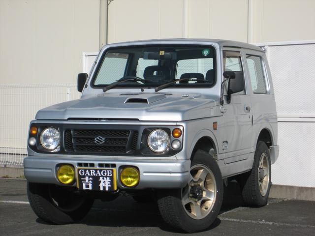 ジムニー(スズキ) ランドベンチャー　４ＷＤ　５速マニュアル　ＤＯＨＣターボ　イエローフォグランプ　ルーフスポイラー　背面タイヤ 中古車画像