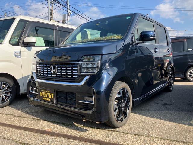 Ｎ−ＷＧＮカスタム(ホンダ) Ｌ・ターボホンダセンシング　スマートキー　衝突被害軽減システム　ナビ　バックカメラ　Ｂｌｕｅｔｏｏｔｈ接続　ＥＴＣ　オートクルーズコントロール　レーンアシスト　クリアランスソナー　ＬＥＤヘッドライト　シートヒーター 中古車画像