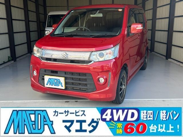 ワゴンＲスティングレー(スズキ) Ｘ　禁煙車　４ＷＤ　ナビ　ＴＶ　衝突被害軽減システム　オートライト　ＨＩＤ　スマートキー　アイドリングストップ　電動格納ミラー　シートヒーター　ベンチシート　ＣＶＴ　盗難防止システム　ＡＢＳ　ＣＤ　ＵＳＢ 中古車画像