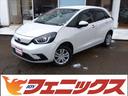 ホンダ フィット ｅ：ＨＥＶホーム☆４ＷＤ☆９型ナビ☆前後ドラレ...