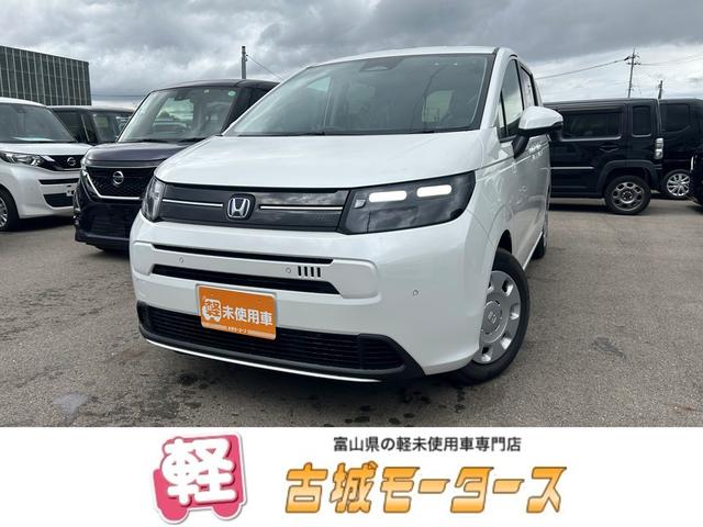 フリード(ホンダ) e:HEVエアー ホンダセンシング 両側電動スライドドア スマートキー Pガラス オートエアコン アイドリングストップ プッシュスタート 電動格納ミラー 中古車画像