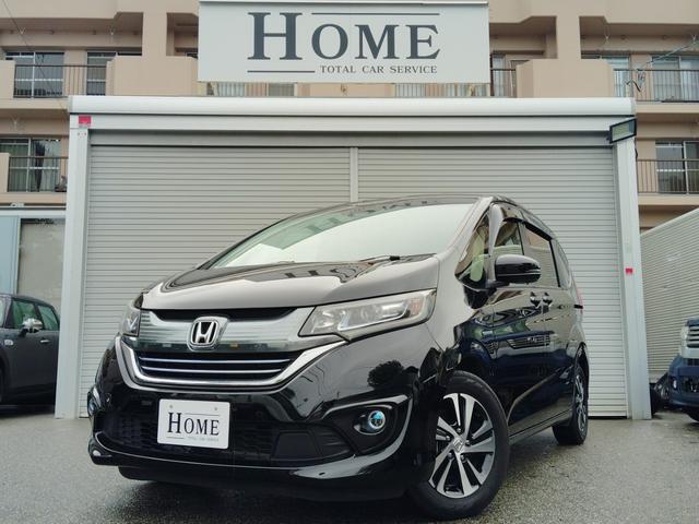 フリードハイブリッド(ホンダ) ハイブリッド・EX ☆ホンダセンシング☆コンフォートビューPKG☆純正9インチナビ&フルセグTV☆バックカメラ☆両側パワースライドドア☆運転席&助手席シートヒーター☆LEDヘッドライト☆LEDフォグ☆ETC 中古車画像