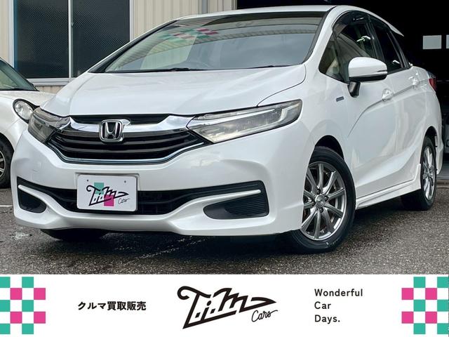 シャトル(ホンダ) ハイブリッドX インターナビ バックモニター LEDヘッドライト クルーズコントロール オートライト ETC フルセグ USB・HDMI接続可能 ステアリングスイッチ 社外15インチアルミ パドルシフト ハーフレザー 中古車画像
