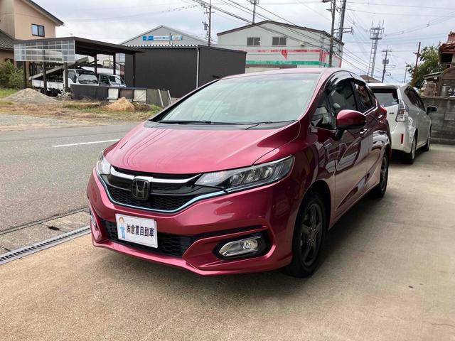 フィットハイブリッド(ホンダ) L ホンダセンシング ハイブリッド ETC バックカメラ ナビ TV オートクルーズコントロール レーンアシスト 衝突被害軽減システム オートライト LEDヘッドランプ スマートキー アイドリングストップ 電動格納ミラー 中古車画像