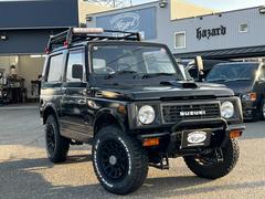 ジムニー ワイルドウインドリミテッド JA11V ターボ AT リフトアップ デルタフォースアルミ M/Tタイヤ シートカバー 中古車画像