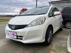 フィット 13G・スマートセレクション ファインスタイル ETC バックカメラ ナビ TV アルミホイール HID スマートキー 電動格納ミラー CVT 盗難防止システム 衝突安全ボディ ABS CD USB ミュージックプレイヤー接続可 Bluetooth 中古車画像