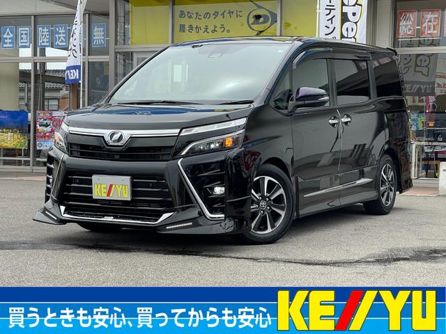 トヨタ ヴォクシー ＺＳ　煌ＩＩ【４ＷＤ】【ＴＲＤエアロ】【走行２９９３ｋｍ】　７人乗り【１オーナー】禁煙車【衝突軽減＆車線逸脱警報】【純正Ｂｌｕｅｔｏｏｈ対応１０型ナビ】バックカメラ　地デジ　両側電動スライド　ＥＴＣ　リヤオートエアコン　コーナーセンサー　クルコン　ＬＥＤライｔ