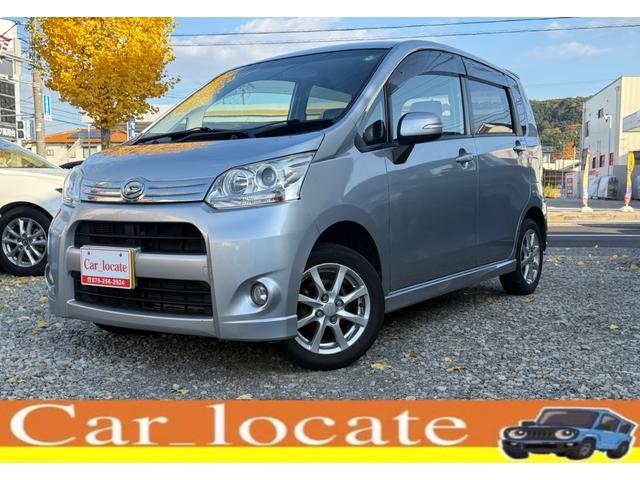 ムーヴ(ダイハツ) カスタム　Ｘリミテッド　純正ナビ　ＦＭ　ＡＭ　ＣＤ　ＡＵＸ　ＴＶ（ワンセグ）　バックカメラ　スマートキー　電動格納ミラー　ＬＥＤヘッドライト　ウィンカーミラー　バイザー　ＡＵＴＯ機能付エアコン　ＭＯＭＯステアリング 中古車画像