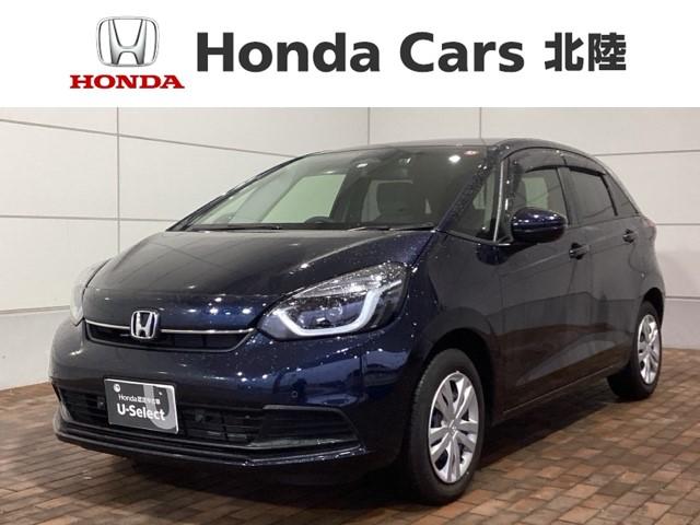 フィット ホーム　ＨｏｎｄａＳＥＮＳＩＮＧ２年保証ナビＲカメラ　被害軽減ブレーキ　ドライブレコーダー　イモビライザー　バックカメラ　ＬＥＤ　クルコン　ＡＡＣ　横滑り防止装置　スマートキー　ワンオーナー　ＡＢＳ　禁煙車（1枚目）