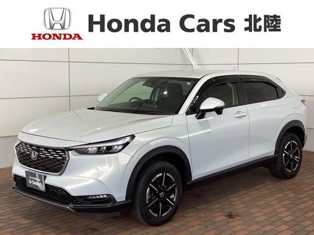 ヴェゼル(ホンダ) ｅ：ＨＥＶＸ　ＨｏｎｄａＳＥＮＳＩＮＧ２年保証純正ナビ　誤発進抑制　Ｂカメ　整備記録簿　オートクルーズコントロール　フルセグテレビ　ＬＥＤヘッドランプ　ナビＴＶ　カーテンエアバック　スマートキ−　キーレスエントリー 中古車画像