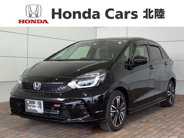 ホンダ フィット ｅ：ＨＥＶＲＳ　ＨｏｎｄａＳＥＮＳＩＮＧ新車保証試乗禁煙車　整備記録簿　盗難防止