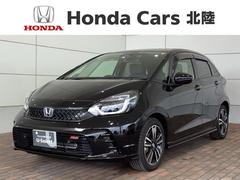 ホンダ　フィット　ｅ：ＨＥＶＲＳ　ＨｏｎｄａＳＥＮＳＩＮＧ新車保証試乗禁煙車　整備記録簿　盗難防止