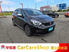 フィット e:HEVリュクス 純正ナビ フルセグ ETC ドラレコ前後 専用シート バックカメラ LEDライト 置くだけ充電 中古車画像