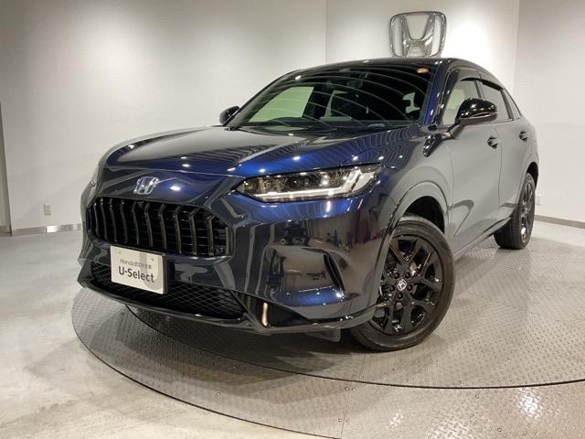 ZR−V(ホンダ) e:HEVZ特別仕様車ブラックスタイル アラウンドビューモニター LEDヘッドランプ スマ−トキ− クルコン ETC車載器 電動シート ドライブレコーダー シートヒーター 本革シート バックカメラ レーンアシスト アダプティブクルーズ 中古車画像