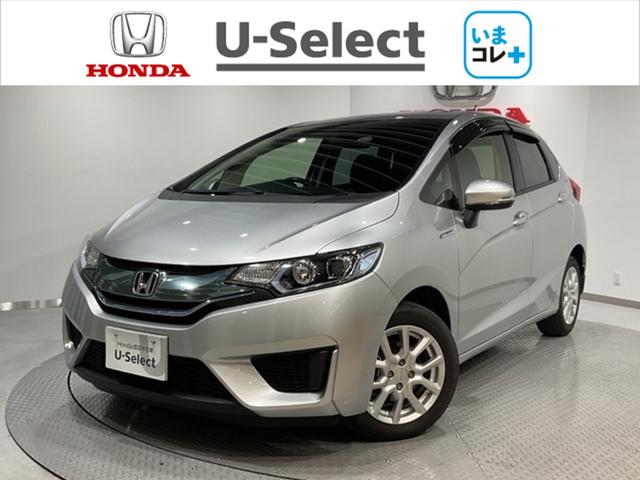 フィットハイブリッド(ホンダ) Ｌパッケージ　１オーナ　ＡＵＴＯライト　ナビ＆ＴＶ　地デジフルセグＴＶ　ＵＳＢ　ＤＶＤ再生　ＬＥＤ　ＥＣＯＮ　バックカメラ　イモビライザー　ＥＴＣ　ＥＳＣ　ＡＵＴＯエアコン　ＡＢＳ　運転席エアバック 中古車画像