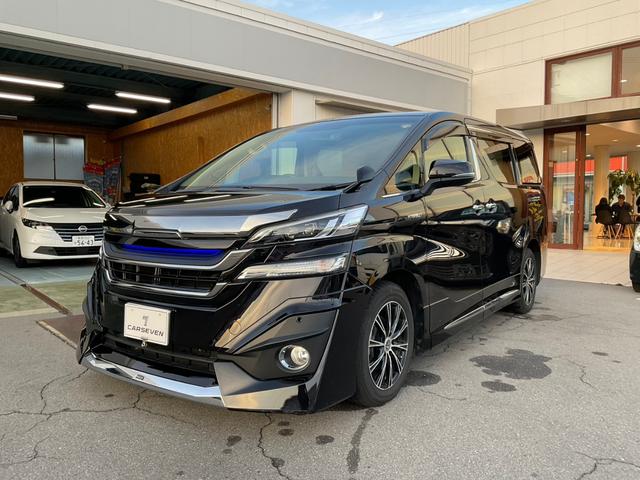 ヴェルファイアハイブリッド(トヨタ) X ワンオーナー モデリスタフロント・サイドスポイラー 社外11インチナビ フルセグ バックカメラ 両側パワースライド LEDヘッドライト スマートキー ETC 前後ドライブレコーダー ノーマルタイヤ有り 中古車画像