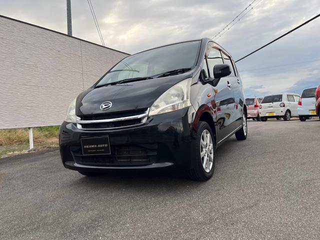 ムーヴ(ダイハツ) Ｘ　４ＷＤ　スマートキー　プッシュスタート　Aftermarketナビ　ワンセグテレビ　エンジンスターター　オートエアコン　アイドリングストップ　ライトレベライザー　電動格納ドアミラー　メンテナンスノート　取扱説明書 中古車画像