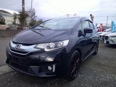 フィットハイブリッド Sパッケージ Sパッケージ 禁煙車 クルコン パドルシフト LEDヘッドライト LEDフォグ リヤスポイラー 社外16インチアルミ フルセグTVナビ バックカメラ 中古車画像