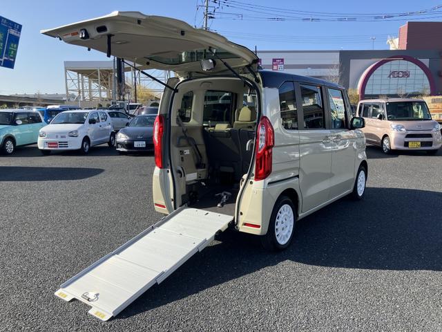 Ｎ−ＢＯＸ(ホンダ) Ｇ・スロープＬターボホンダセンシング　福祉車両　４ＷＤ　８インチフルセグナビ　２トーンカーラースタイル（ブラウンルーフ　ブラウンドアミラー　２トーン仕様スマートキー）　モデューロＡＷ　ギャザズドライブレコーダー 中古車画像