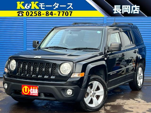 ジープ・パトリオット スポーツ　東海仕入れ　後期モデル　切り替え式４ＷＤ　ルーフレール　ＨＤＤナビ　バックカメラ　サイドブラインドカメラ　フルセグＴＶチューナー　クルーズコントロール　純正アルミホイール　ＨＩＤヘッドライト　ＥＴＣ（1枚目）