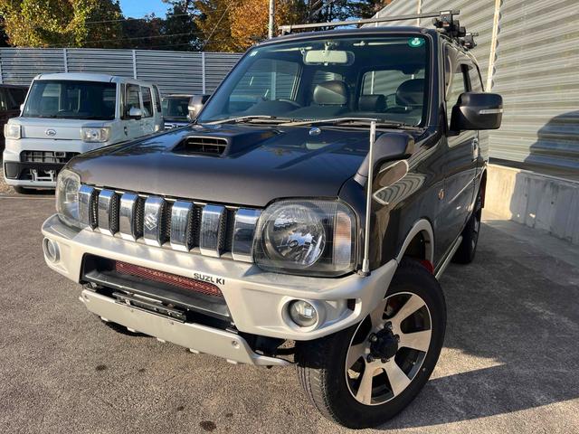 ジムニー(スズキ) クロスアドベンチャーＸＣ　４ＷＤ　キーレスエントリー　電動格納ミラー　シートヒーター　ＭＴ　ＡＢＳ　ＣＤ　ミュージックプレイヤー接続可　アルミホイール　衝突安全ボディ　エアコン　パワーウィンドウ 中古車画像