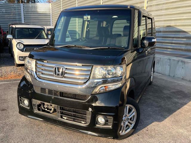 Ｎ−ＢＯＸカスタム(ホンダ) Ｇ・Ｌパッケージ　ＥＴＣ　バックカメラ　両側スライド・片側電動　ナビ　オートライト　ＨＩＤ　スマートキー　アイドリングストップ　電動格納ミラー　ベンチシート　ＣＶＴ　盗難防止システム　ＡＢＳ　ＥＳＣ　チップアップシート 中古車画像
