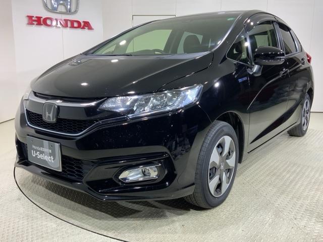 フィットハイブリッド(ホンダ) Ｌホンダセンシング　軽減ブレーキ　Ｒカメ　ＬＥＤ　サイドＳＲＳ　横滑り防止　フルセグテレビ　記録簿　ナビＴＶ　パワーステアリング　盗難防止装置　オートクルーズ　ＥＴＣ車載器　ＤＶＤ再生　ＡＢＳ 中古車画像