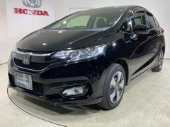 フィットハイブリッド Lホンダセンシング 軽減ブレーキ Rカメ LED サイドSRS 横滑り防止 フルセグテレビ 記録簿 ナビTV パワーステアリング 盗難防止装置 オートクルーズ ETC車載器 DVD再生 ABS 中古車画像