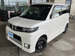 ゼストスパーク W 4WD タイミングベルト交換済み バックカメラ HIDヘッドランプ フォグ 社外ナビ・フルセグテレビ スマートキー オートエアコン 革巻きステアリング 中古車画像