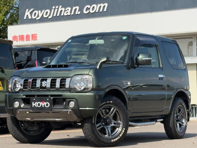 ジムニー(スズキ) ランドベンチャー パナソニックSDナビ フルセグTV バックモニター 革巻きステアリング ハーフレザーシート 運転席シートヒーター ETC車載器 サイドステップ LEDウィンカーミラー 純正16インチAW スペアタイヤ 中古車画像